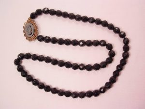 Black Glass Necklace with Cameo Clasp