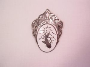 Siam Dancer on White Enamel Oval and Filigree Sterling Pin
