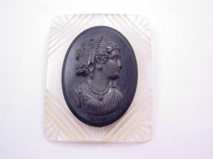 Lucite and Black Plastic Cameo Brooch
