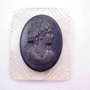 Lucite and Black Plastic Cameo Brooch