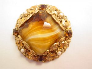 Carmel-Colored Rhinestone and Filigree West Germany Round Pin