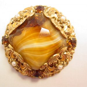 Carmel-Colored Rhinestone and Filigree West Germany Round Pin