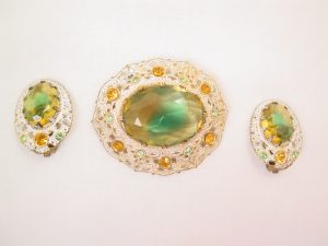 Green and Topaz-Colored Rhinestone in White Frame West German Set
