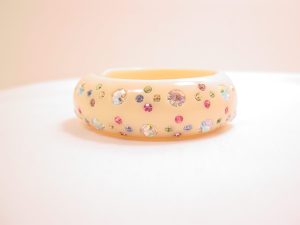 Weiss Pastel and Aurora Borealis Rhinestone Imbedded Plastic Hinged Bracelet