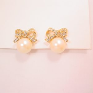 Nina Ricci Rhinestone Bow and Pearl Earrings