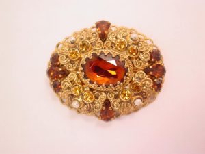 West Germany Dark Brown and Topaz Rhinestone Filigree Pin
