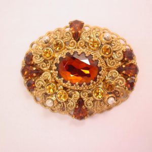 West Germany Dark Brown and Topaz Rhinestone Filigree Pin