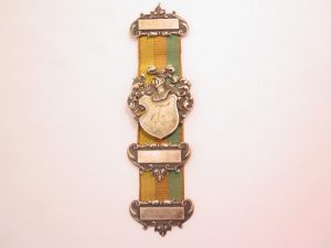 Old Silver-Plated Knight's Helmet and Shield on Ribbon Watch Fob