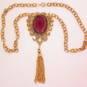 Giant Curlicue Design and Purple Rhinestone Necklace