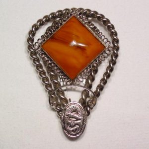 Large Bakelite Southwestern Dress Clip