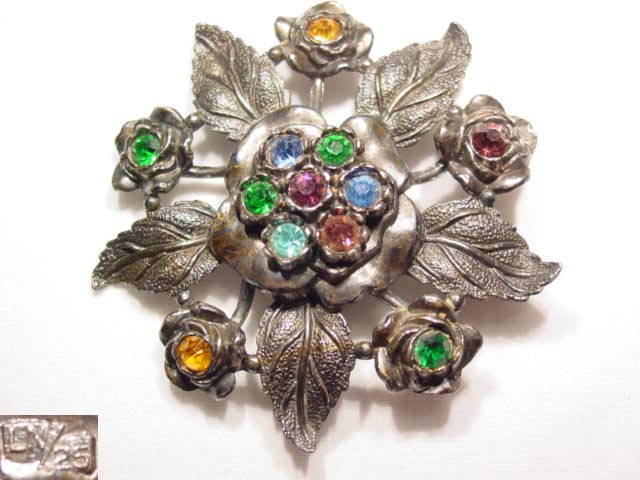 Heavy Silvertone Floral and Rhinestone Little Nemo Pin