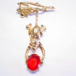 BM Dangling Monkey Holding Red Stone Pin