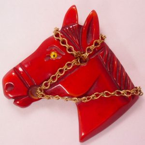 Old Dark Bakelite Horsehead Pin