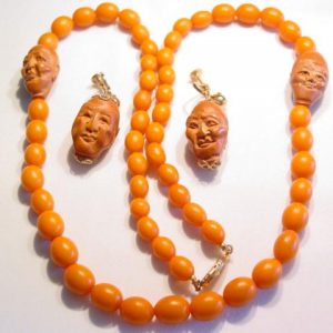 Unusual Oriental Carved Faces Necklace and Earrings Set